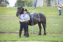 Officer Erick Little w/horse.
