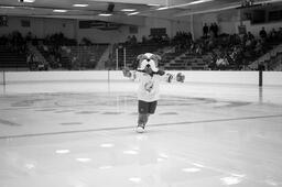 Brutus playing hockey.