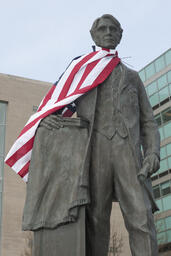 Woodbridge N. Ferris statue flag.