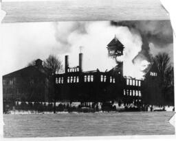 Old Main burning feb. 21 1950  Pharmacy annex is behind Old Main