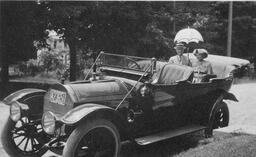 Woodbridge Ferris  and Helen Ferris riding in vehicle.