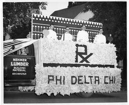 Homecoming parade. Phi Delta Chi float. 1952.
