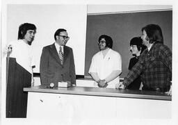 Pharmacy guest speaker Rodney Ice in class with faculty Rusan Rowles. 1974.