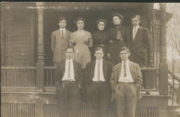 Students in front of house.